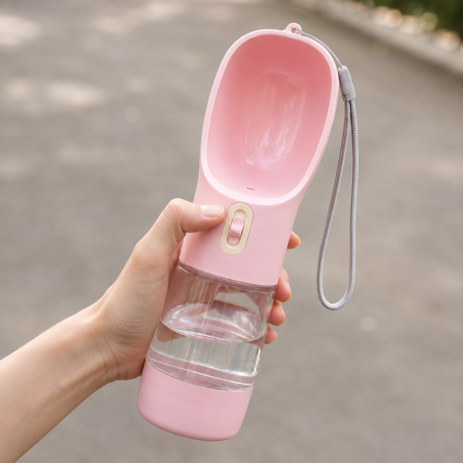 Pinkfarbene tragbare Hundetrinkflasche mit Trinkschale